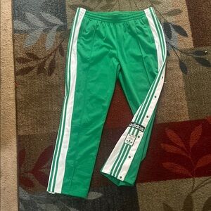 Adidas Green and White Sweatpants with Iconic Stripes